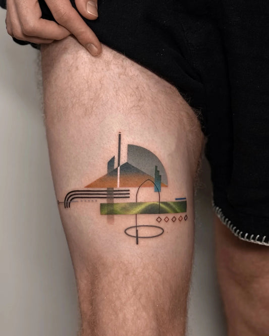 Bang Bang Basil color geometric abstract tattoo on thigh