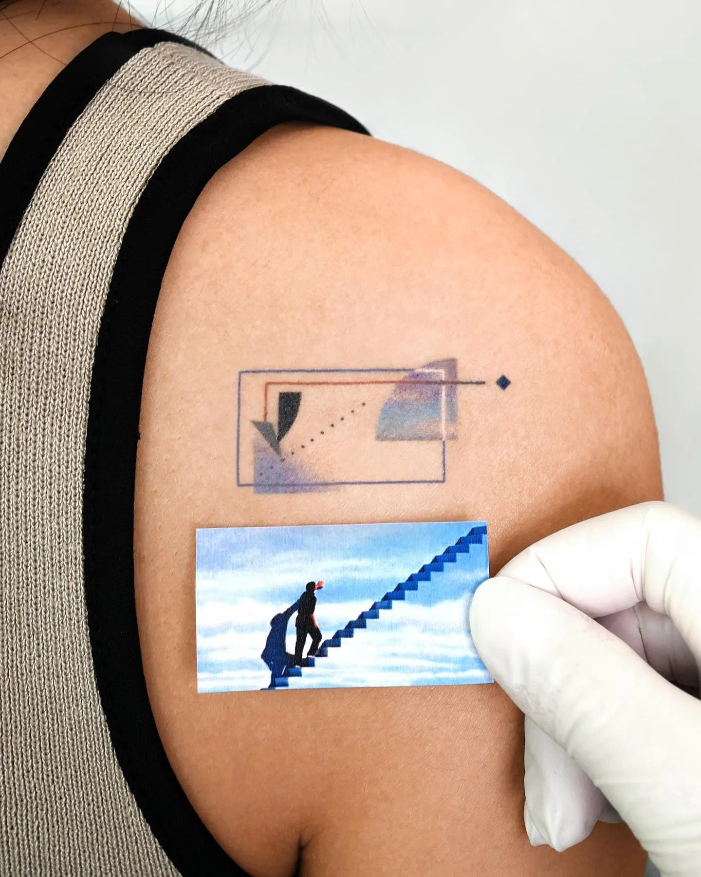 Bang Bang Basil color geometric abstract tattoo on woman shoulder