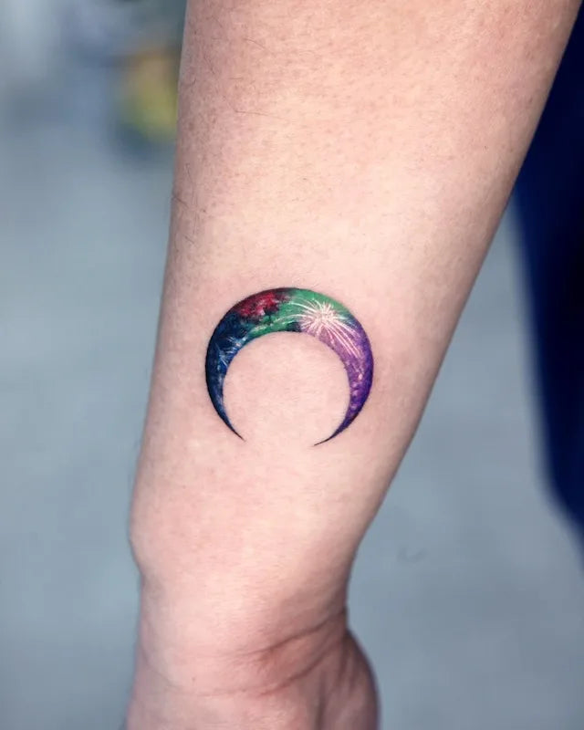 colorful crescent moon color realism tattoo
