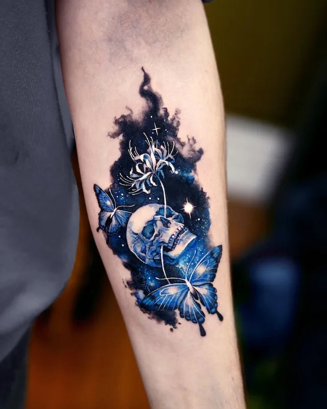 dark blue color realism skull flower butterfly tattoo