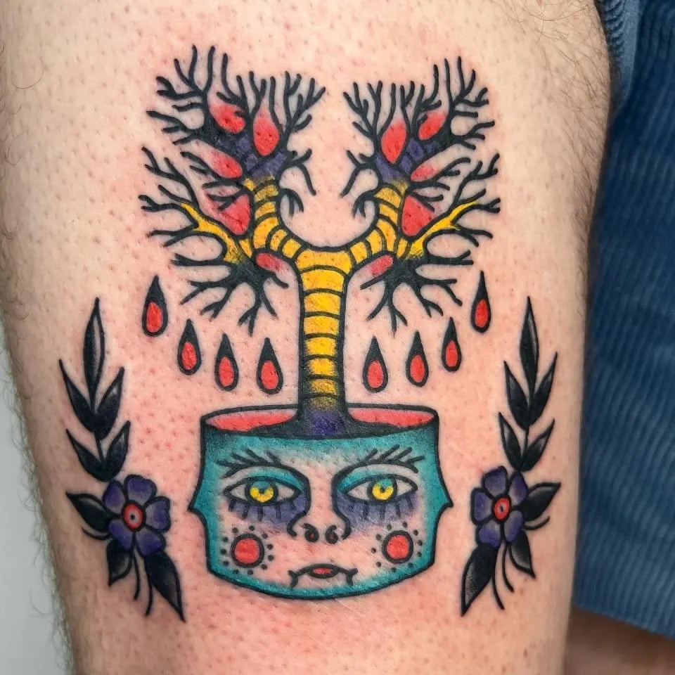 american traditional potted plant with face tattoo