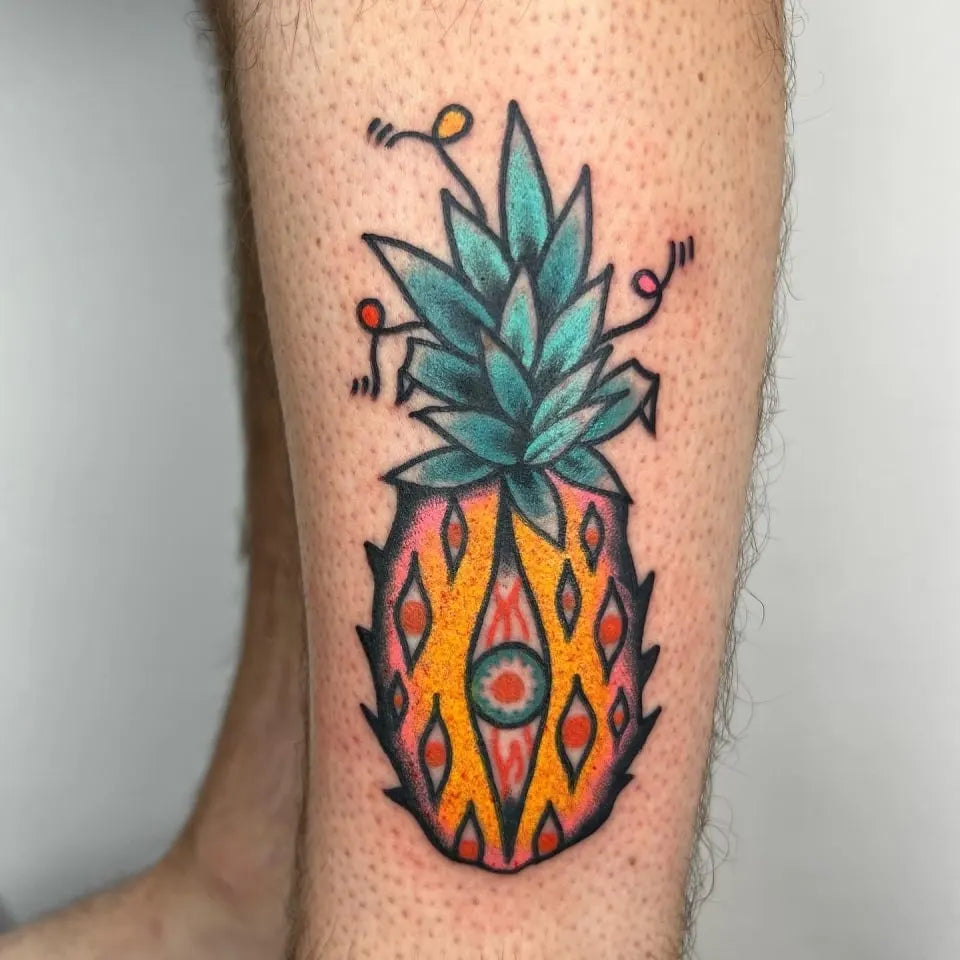 american traditional pineapple with eye tattoo