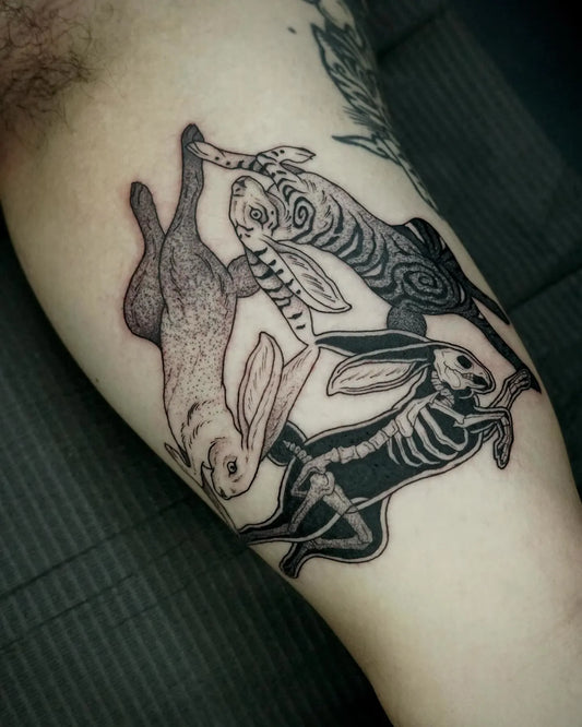 dotwork three rabbits abstract tattoo