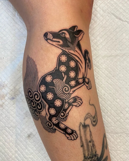 thai traditional fox tattoo on leg
