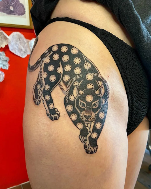 thai traditional panther tiger tattoo on woman thigh hip