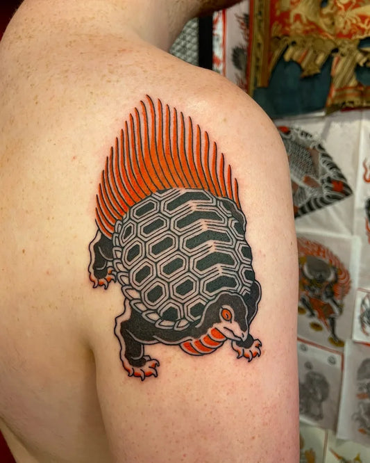 thai traditional red tail turtle tattoo on man shoulder