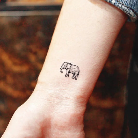 Tiny Elephant Wrist Tattoo for Women