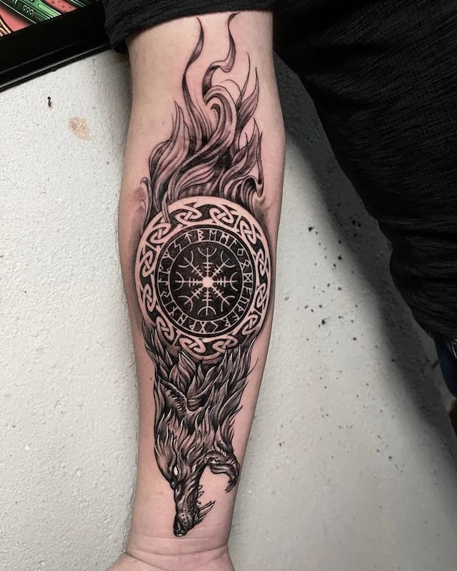 viking nordic wolf black and grey tattoo on man forearm
