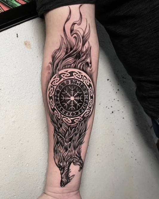 viking nordic wolf black and grey tattoo on man forearm