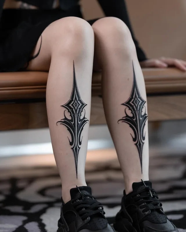 blackwork tribal Ornaments tattoo on woman legs