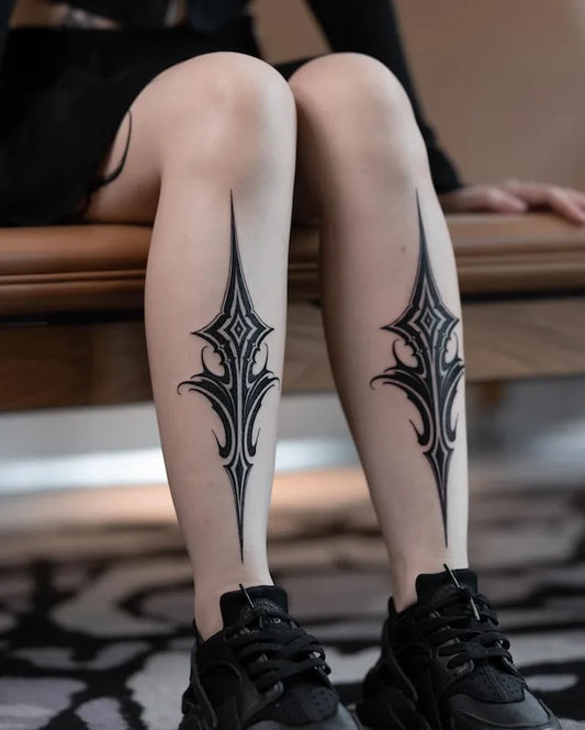 blackwork tribal Ornaments tattoo on woman legs