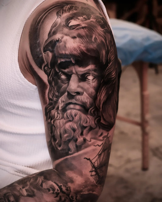 realistic black and grey greek god poseidon zeus upper arm man tattoo