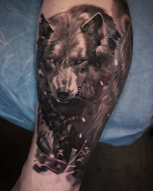 black and grey wolf tattoo