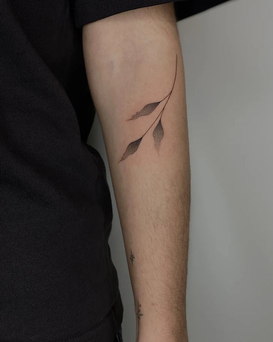 minimalist dotwork leaves tattoo
