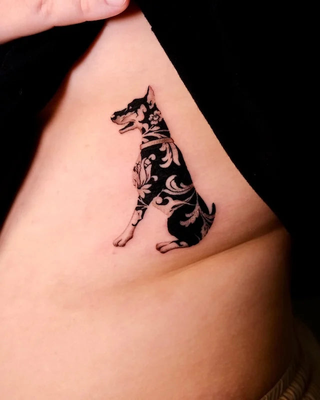 blackwork floral dog tattoo