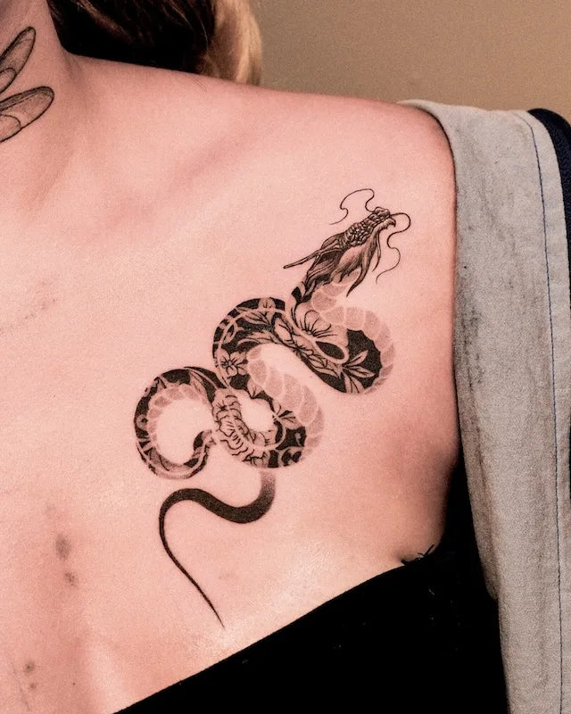 floral dragon black and grey tattoo on woman shoulder