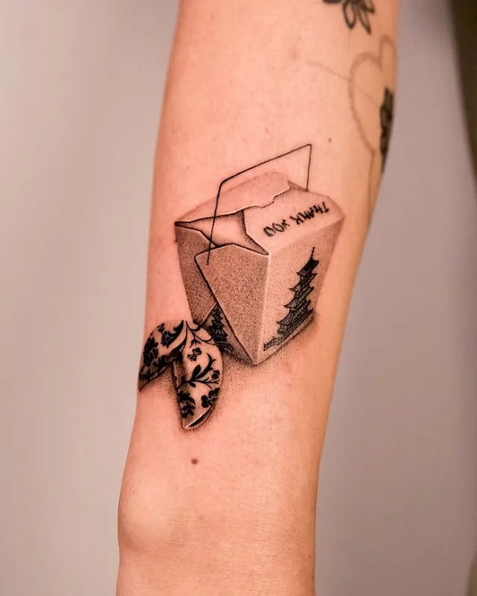 black and grey realistic dotwork chinese food takeaway tattoo on forearm