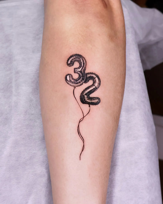 realistic 32 balloon tattoo