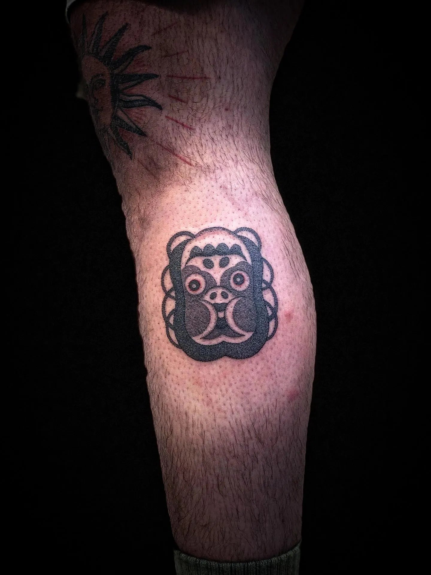 japanese dotwork animal tattoo on man calf leg