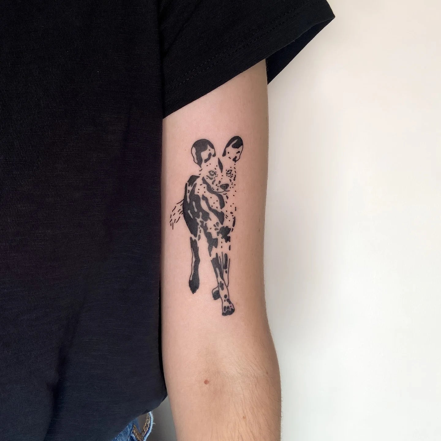 blackwork dotwork animal upper arm tattoo